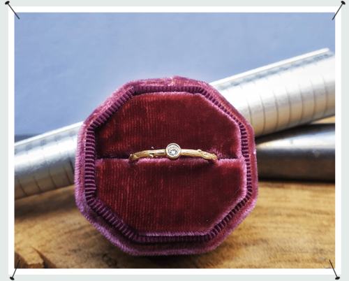Yellow golden engagement ring 'Orchard' . A twig ring with a  0,10 crt diamond. Oogst Amsterdam.