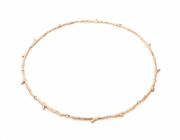 Yellow gold necklace Orchard, refined twigs with diamonds. Oogst goldsmith Amsterdam atelier.