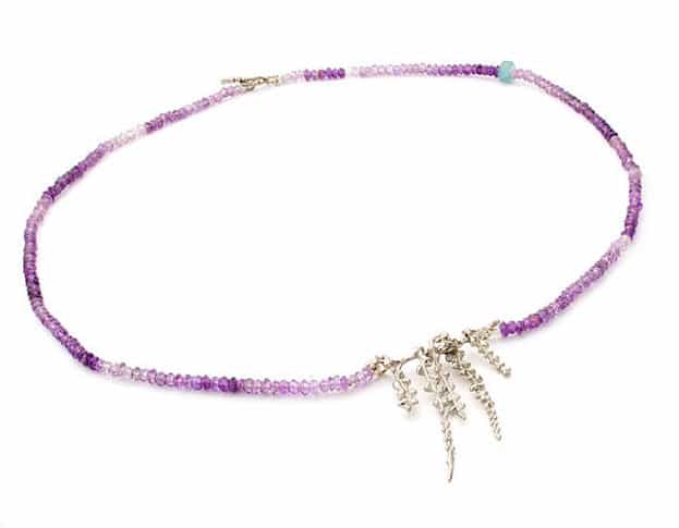 Amethyst necklace with a white gold blossom twig from the Japonais series. Oogst goldsmith Amsterdam
