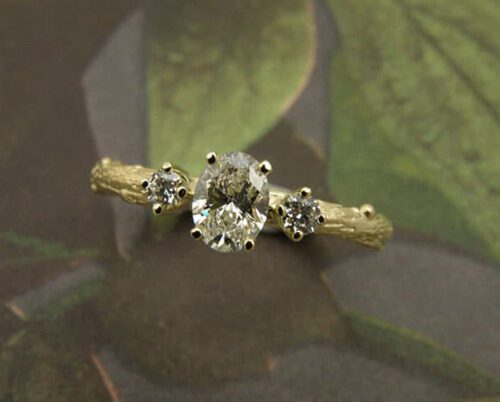 engagement ring 'Orchard'  * yellow gold twig with an oval cut 0,40 ct diamond and 2x brilliant cut 0,05 ct diamonds. Design by Oogst Jewellery in Amsterdam