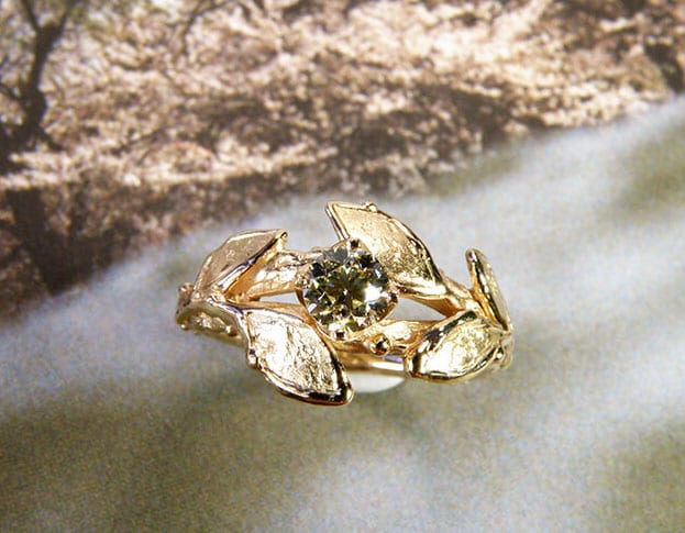 Rosé gold engagement ring with 0,40 ct brilliant cut diamond cape. With delicate Leaves. Created by Oogst amsterdam.