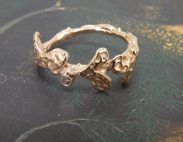 Rose golden 'Leaves' ring with texture and a 0,03 ct brown diamond. Design by goldsmith Oogst in Amsterdam