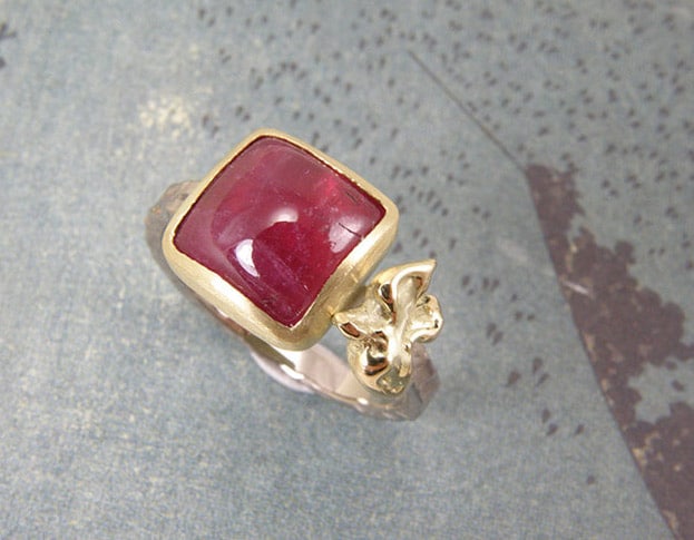 White gold ring 'Swell' with cabochon cut pink tourmaline and a yellow dove. Statement gemstone ring by Oogst Amsterdam