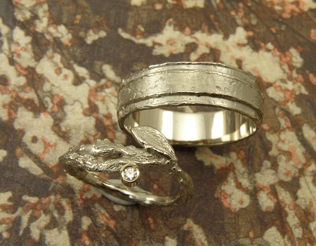 Botanical Wedding rings 'Erosion' and 'Orchard'. White golden textured rings. Oogst goldsmith Amsterdam.