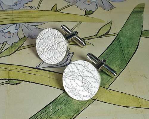 Zilveren manchetknopen met stof patroon, Silver cufflinks with pattern. oogst goudsmid Amsterdam