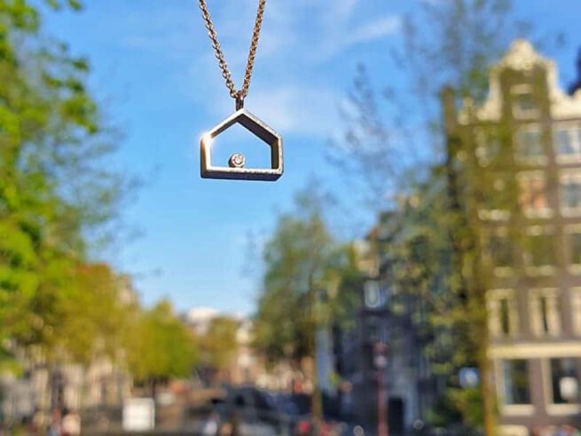 White gold pendant House with a diamond. Oogst design & creation Amsterdam.