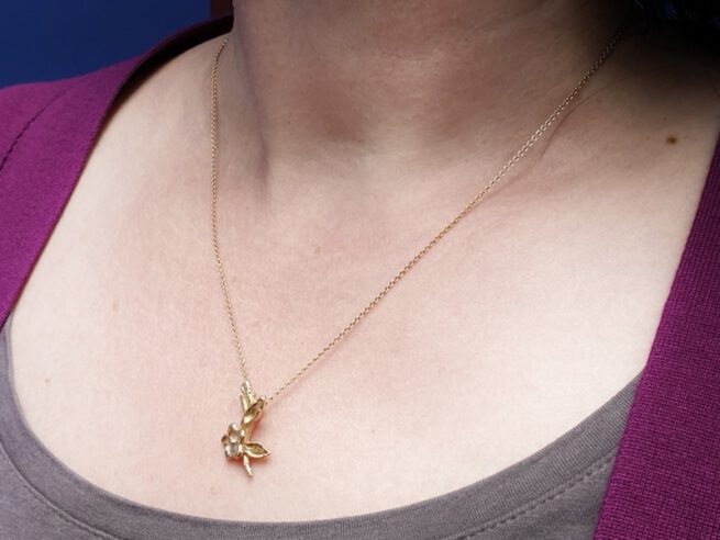 Pendant 'In Bloom', rosé gold flowers on a branch . Oogst goldsmith Amsterdam