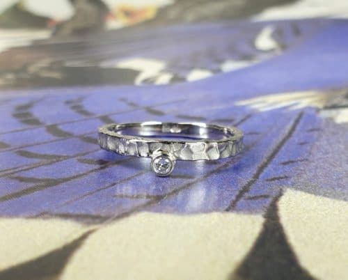 Witgouden 'Deining' ring met diamant. Oogst goudsmeden Amsterdam