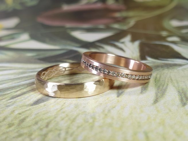 Yellow gold and rose gold wedding bands with pave set diamonds all around. Design by goldsmith Oogst in Amsterdam