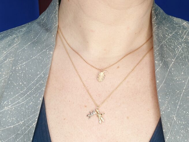 Rosé gold Oak leaf pendant. White and yellow gold Dragonfly pendant. Design by Oogst goldsmith Amsterdam