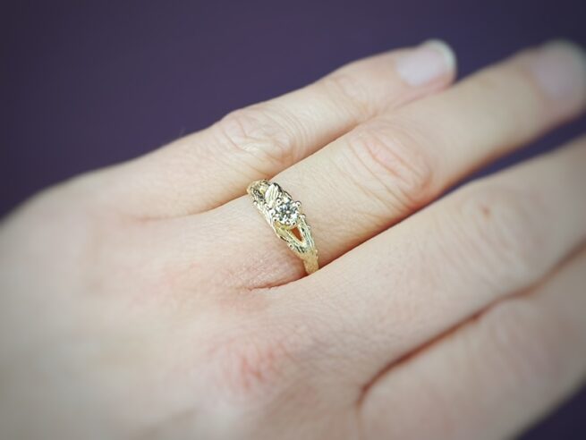 Engagement ring yellow gold twig with a diamond cape. From the Orchard series. Design by Oogst Goldsmith in Amsterdam