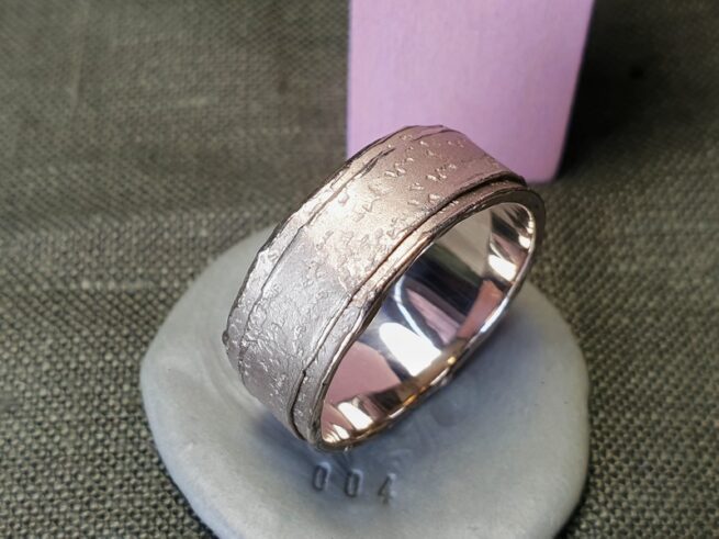 White gold Erosion ring. Robust texture men's ring. Design by Oogst Goldsmith in Amsterdam