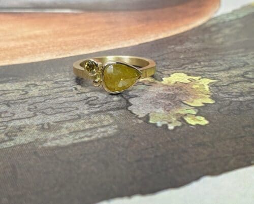 Ring 'Cluster'. Created from own heirloom gold with a natural fancy pear shaped diamond mustard yellow, a brilliant cut olive diamond and a cute berry. Custom created in the Oogst studio.