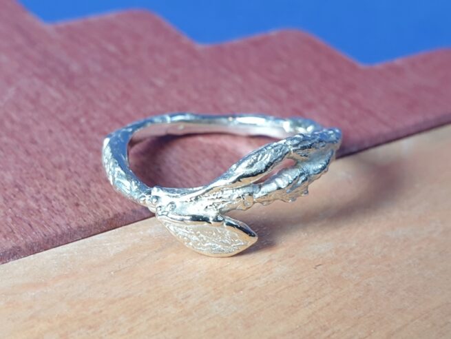 Silver Twig ring with a small leaf from the Orchard series. Oogst Jewellery in Amsterdam.