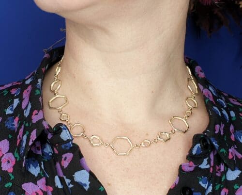 Yellow gold necklace with amorphous and angular shaped open links. Design by Oogst Jewellery in Amsterdam