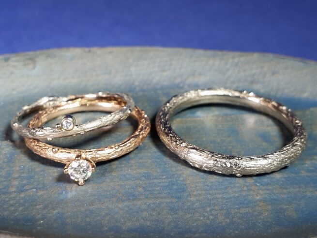 Wedding rings Orchard. Rose gold twig with diamond and white gold twig.  Oogst goldsmith in Amsterdam.
