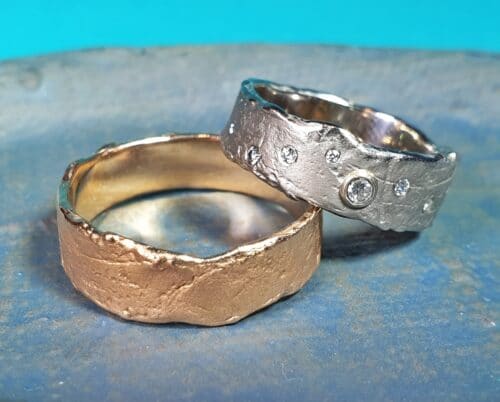 Handmade wedding rings Erosion. White gold ring with diamonds. Rose gold textured wedding ring. Oogst goldsmith Amsterdam.