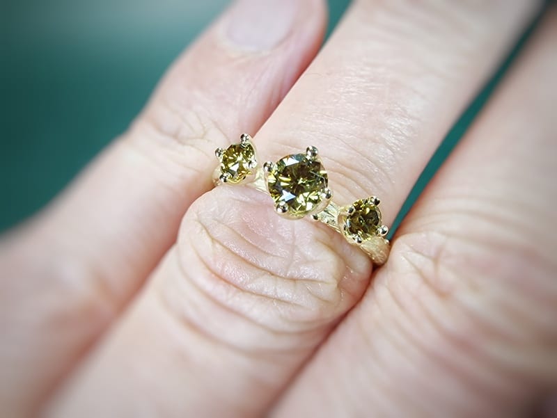 Yellow gold engagement ring with 3 olive diamonds from our Orchard series. Design by Oogst Jewellery in Amsterdam