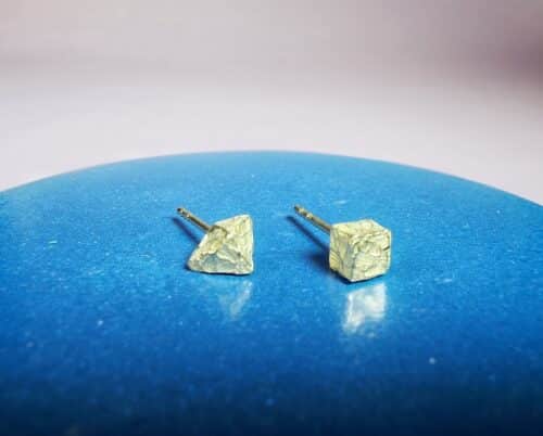 Yellow gold 'Crystals' ear studs. Both are different in shape. Design by Oogst Jewellery in Amsterdam