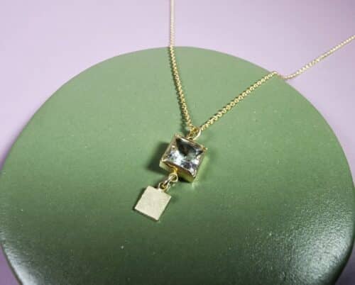 Yellow gold pendant with a twinkling prasiolite from our 'Square' series. Design by Oogst Jewellery.