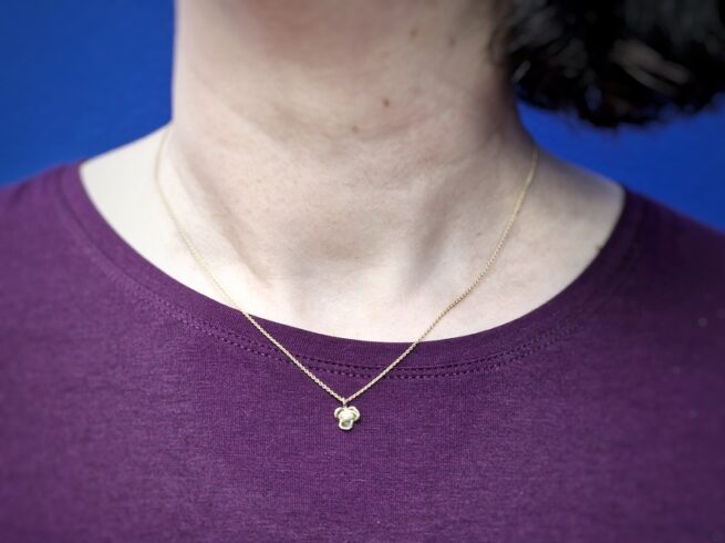 Yellow gold pendant with a twinkling diamond from our 'In bloom' series. Design by Oogst jewellery