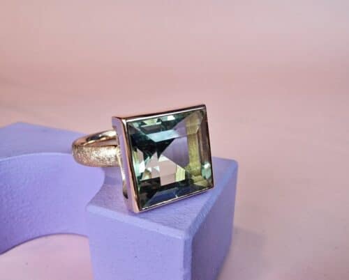 Gemstone ring with prasiolite from our Square series. Statement ring created in the Oogst goldsmith studio in Amsterdam.