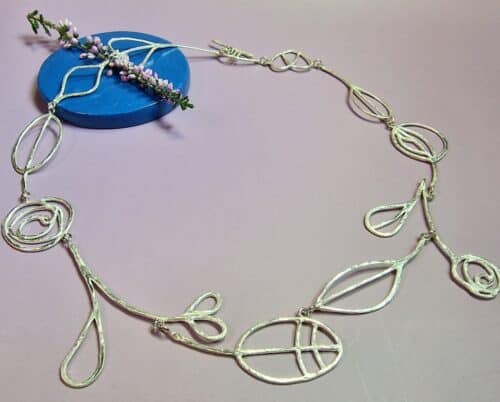 Silver necklace  Mackintosh ornaments, design by Oogst Jewellery in Amsterdam