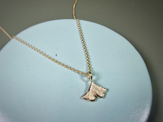 Yellow gold pendant from the Ginkgo series. Design by Oogst Jewellery in Amsterdam