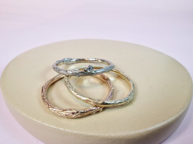 Stack rings yellow gold twig and rose gold and white gold twig ring. From the Orchard series. Design by Oogst in Amsterdam