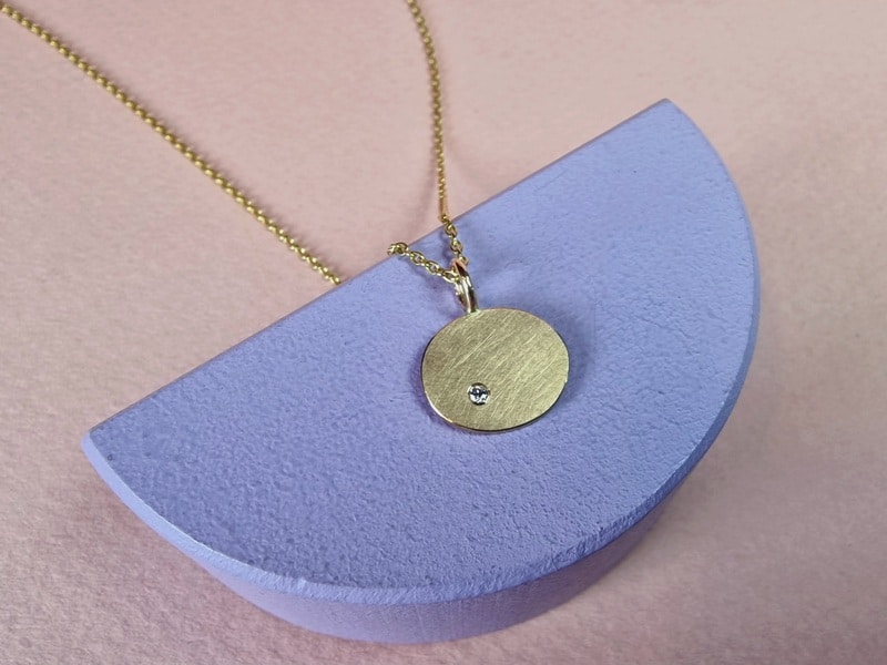 Refined rosé golden pendant with lavender pink diamond from the Circles series. Created at the Oogst studio.